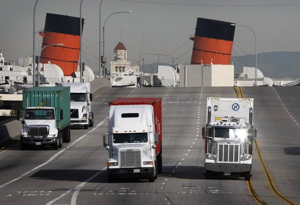 Obama Sets Deadline for Trucks' Fuel-Economy Standards