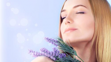 woman enjoying flower lavender scent